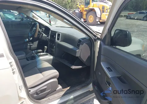 2010 Jeep Grand Cherokee Laredo из США, поврежденный, VIN 1J4PR4GK2AC152147